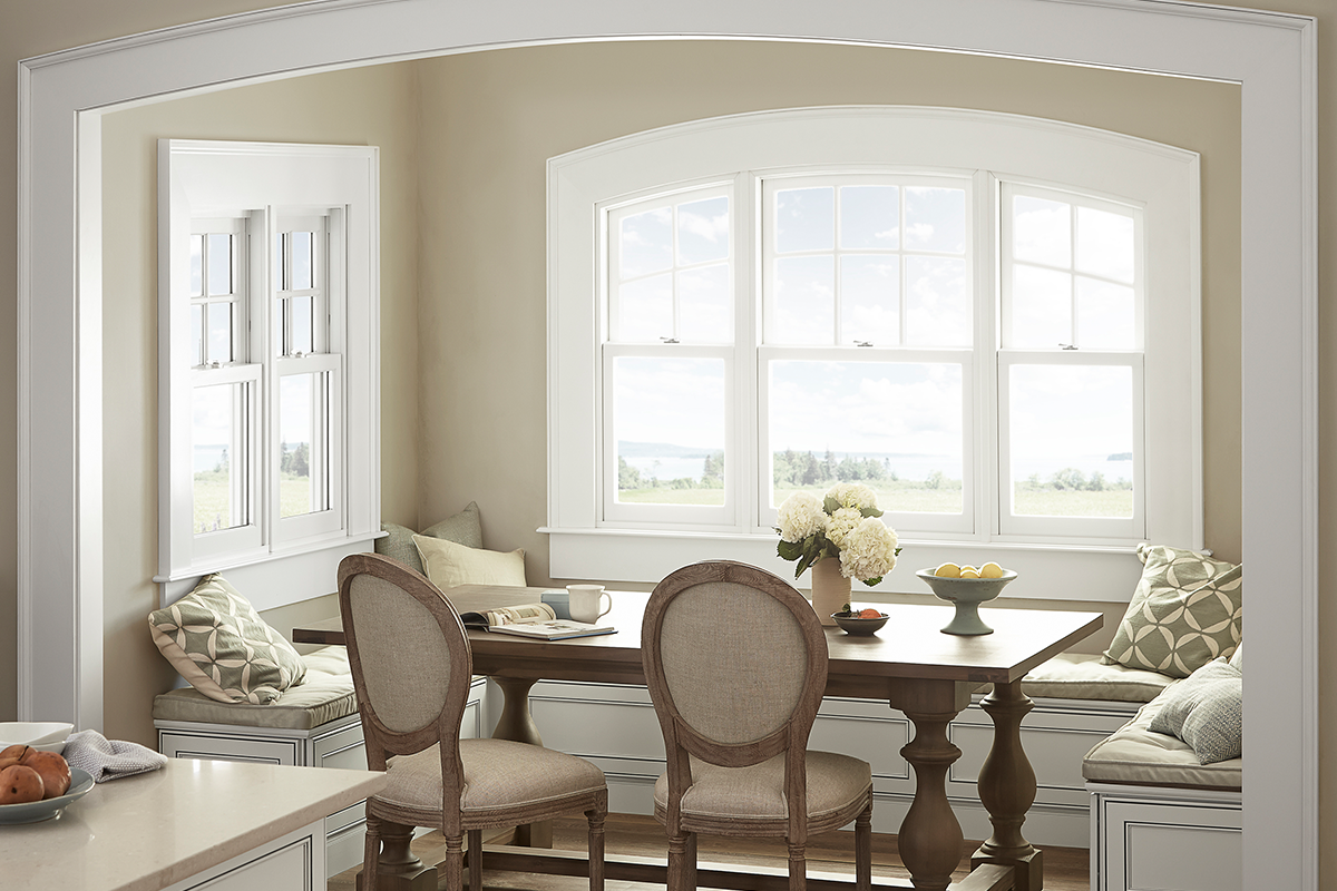 Breakfast nook with double hung windows
